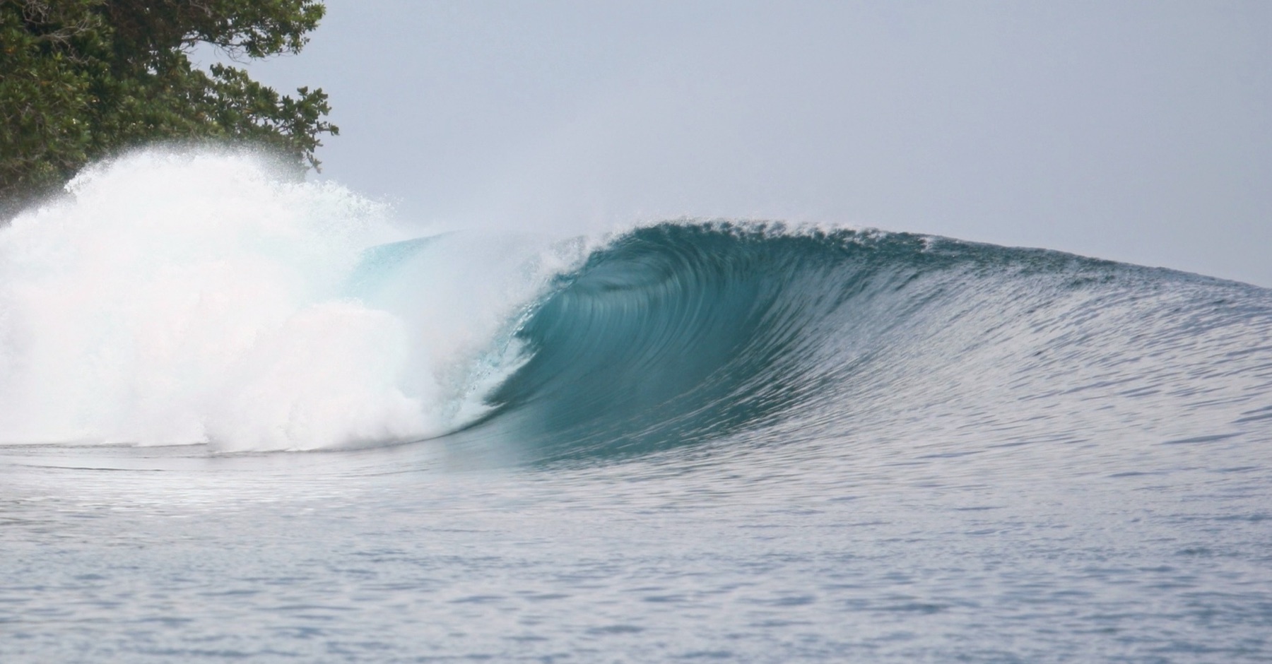 Surf at Lolok Point